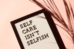 A sign that says self care isn't selfish